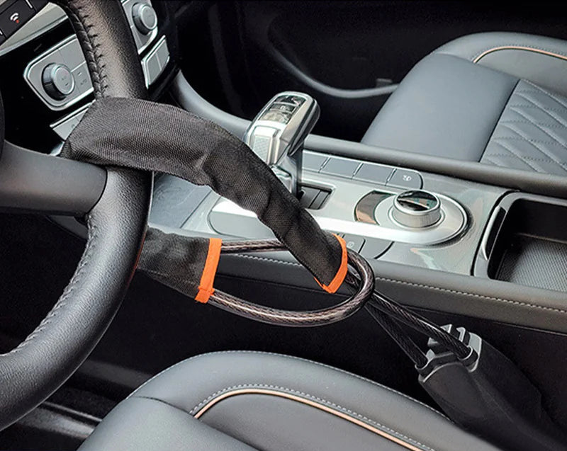 Steering wheel security lock installed on a car steering wheel