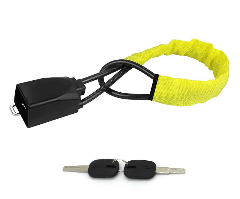 Yellow steering wheel security lock with keys on a white background